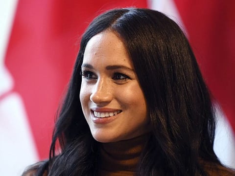 Britain's Meghan, Duchess of Sussex reacts during her visit to Canada House in thanks for the warm Canadian hospitality and support they received during their recent stay in Canada, in London on January 7, 2020. (Photo by DANIEL LEAL-OLIVAS / POOL / AFP)