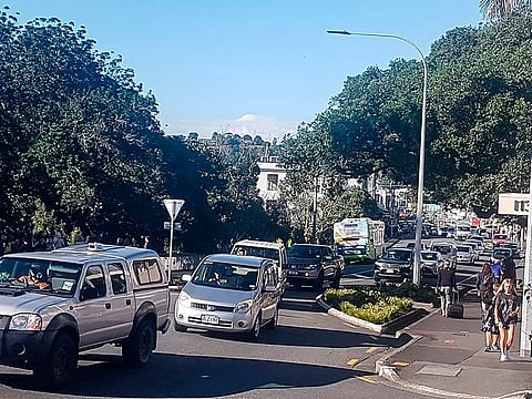 Traffic slowly works up to high ground at Whangarei, New Zealand, as a tsunami warning is issued Friday, March 5, 2021.