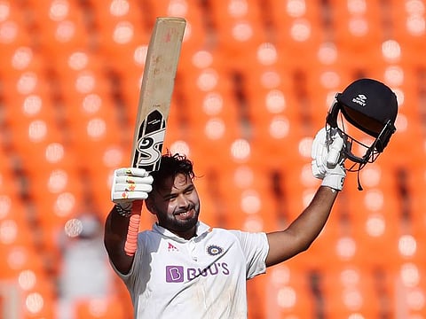 Rishabh Pant, who scored his third Test century under trying circumstances, acknowledges the crowd in Ahmedabad.