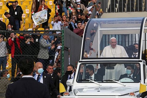 Pope Francis arrives to lead a mass at the Franso Hariri Stadium in Erbil, Iraq March 7, 2021.