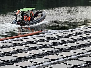 Space-starved Singapore builds floating solar farms in climate fight