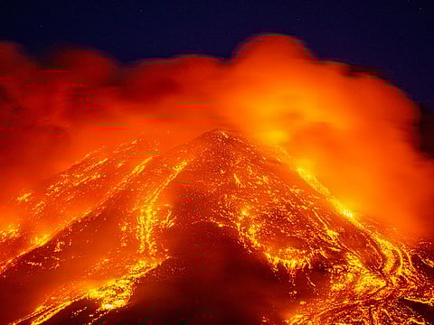 Lava gushes from the Mt. Etna volcano near Catania, southern Italy.