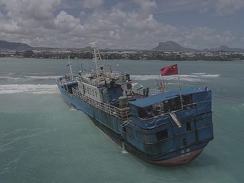 An aerial view shows Chinese fishing vessel Lurong Yuan Yu that ran aground on reefs of Pointe-aux-Sables in Port Louis, Mauritius.