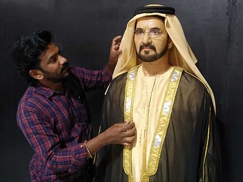 Kerala sculptor V.S. Harikumar with a wax image of His Highness Sheikh Mohammed Bin Rashid Al Maktoum, Vice-President and Prime Minister of the UAE and Ruler of Dubai, at his wax museum in Kumily, Kerala.