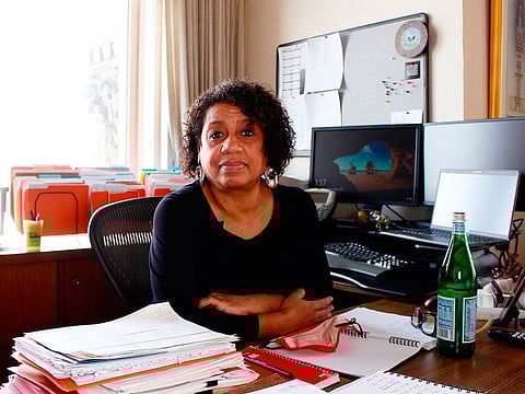 Kimberly Montgomery sits for a photo in her office in City Hall, in Milwaukee. Montgomery lost 15 people in her life to COVID-19. "I don't know if I ever will ever be able to process all of them," she said.