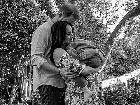 Prince Harry and Meghan, The Duke and Duchess of Sussex, pose with their son Archie in this undated handout photo.