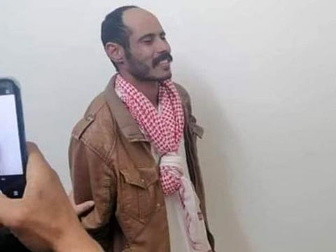 The suspect who allegedly slit the throats of his little daughters.