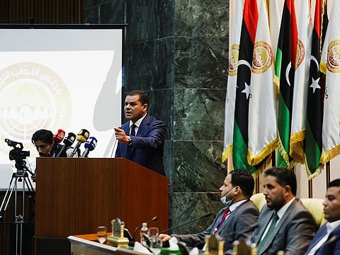 Libya's new Prime Minister Abdul Hamid Dbeibeh gestures as he speaks in parliament in Sirte, Libya March 9, 2021.