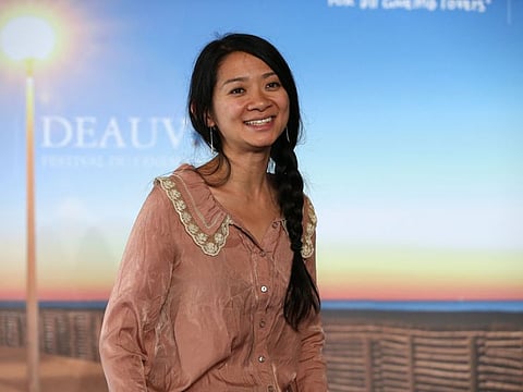 In this file photo taken on September 5, 2015, US-Chinese director Chloe Zhao poses during a photocall to present the movie "Songs My Brothers Taught Me" in the French northwestern sea resort of Deauville, during the 41th Deauville US Film Festival.