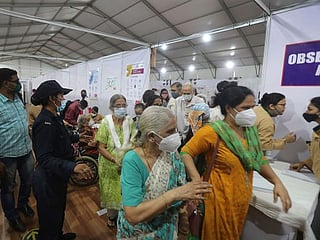 COVID-19: India's elderly leave isolation to get vaccinated