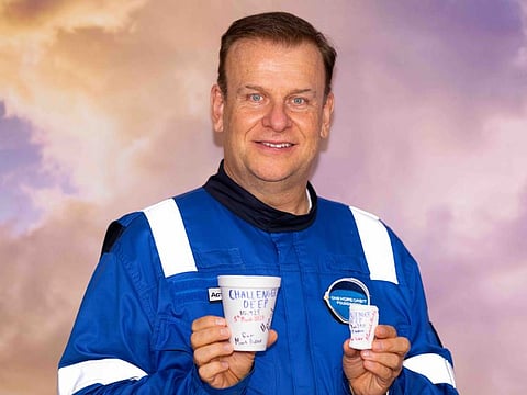 Hamish Harding shows Gulf News a styrofoam cup that was attached outside the submersible during the dive. It was crushed to a quarter of its original size, proving how hard the pressure was.