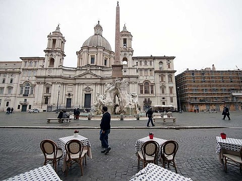 Empty tables are pictured in Piazza Navona as the government is due to announce stricter coronavirus disease (COVID-19) restrictions, in Rome, Italy, March 12, 2021.