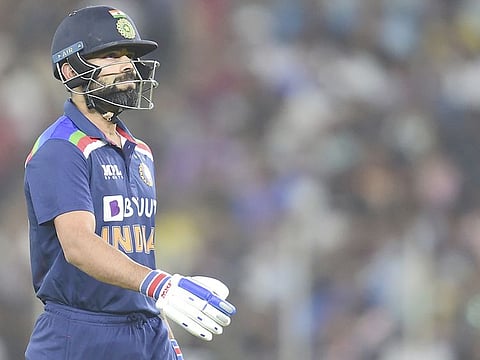 Indian skipper Virat Kohli returns to the pavillion after being dismissed during the first T20 vs England, at Narendra Modi Stadium in Ahmedabad, on Friday.
