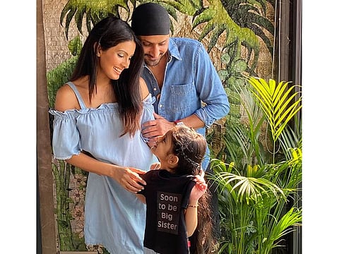 Harbhajan Singh with with Geeta Basra and daughter Hinaya Heer Plaha announce the good news