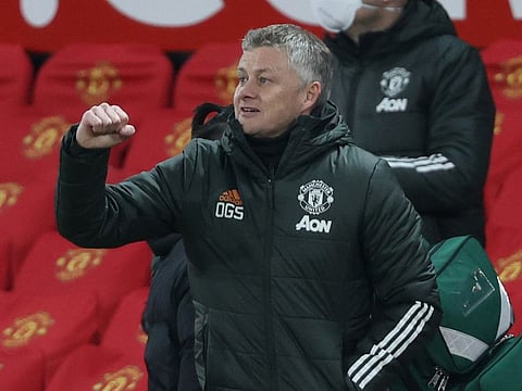 Manchester United manager Ole Gunnar Solskjaer celebrates after the match.