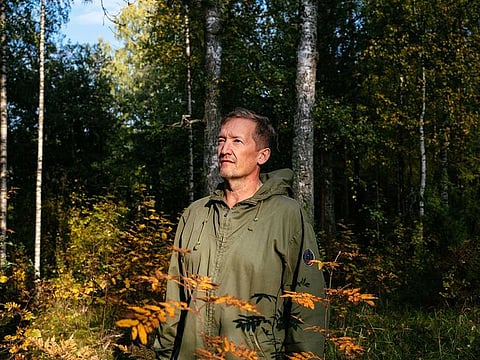 Mika Vanhanen poses for a picture in a forest area near Joensuu, Finland, on September 24, 2020. Former schoolteacher Mika Vanhanen has overseen the planting of 30 million trees across the globe via a network of 10,000 schools he recruited over two decades.