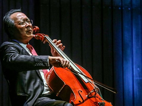 In this file photo French-born Chinese-American cellist Yo-Yo Ma plays during a concert at the Metropolitan Theater in Medellin, Antioquia department, Colombia on May 9, 2019.