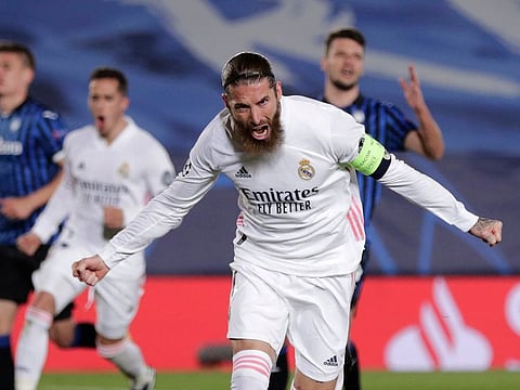 Real Madrid's Sergio Ramos celebrates scoring his side's 2nd goal.