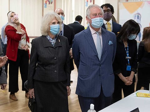 Britain's Prince Charles and Camilla, Duchess of Cornwall, visit a vaccination pop-up centre at Finsbury Park Mosque in north London, Tuesday March 16, 2021.