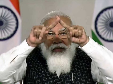 Prime Minister Narendra Modi speaks during a meeting with Chief Ministers over a spike in the COVID-19 case, via video conferencing, in New Delhi