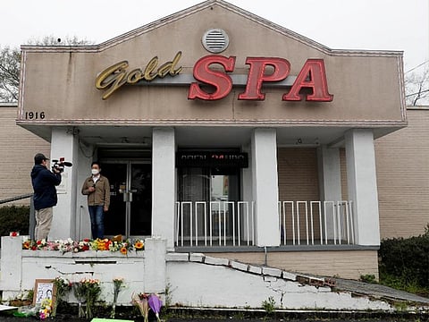Flowers are laid in front of Gold Spa following the deadly shootings in Atlanta, Georgia, US.