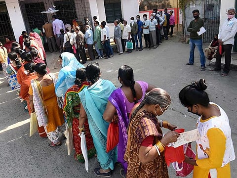 Senior citizens stand in queue to get COVID-19 vaccines during the second phase of vaccination, in Patna on Friday, March 5, 2021.