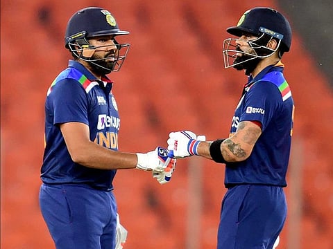 Indian skipper Virat Kohli (right) and Rohit Sharma during fifth and final T20 match against England, at the Narendra Modi Stadium in Ahmedabad, on March 20, 2021.