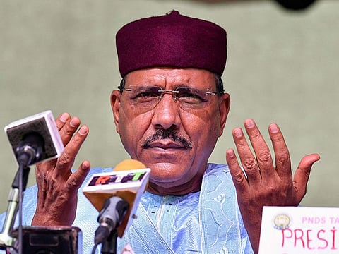 In this file photo taken on February 23, 2021 Niger's newly elected president Mohamed Bazoum gestures at his party headquarter after the announcement of his election in Niamey, on February 23, 2021.