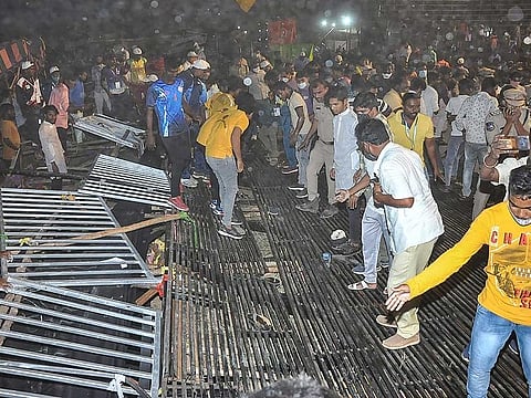 Spectators assess the scene after a stand collapsed during the 47th Junior National Kabaddi Championship, in Suryapet, Monday, March 22, 2021.