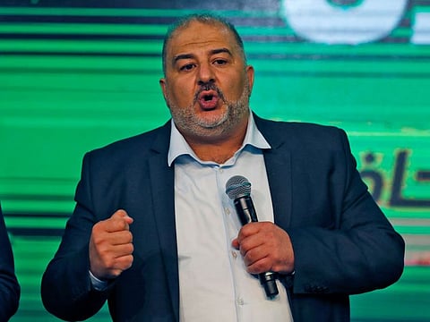 Mansour Abbas, leader of the United Arab List, speaks to supporters from his campaign headquarters in the northern Israeli city of Tamra on March 23, 2021, before polling stations closed during the fourth Israeli national election in two years.