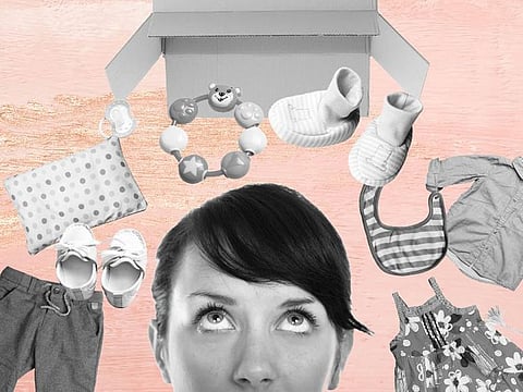 Why do some parents find it so hard to let go of old baby clothes?