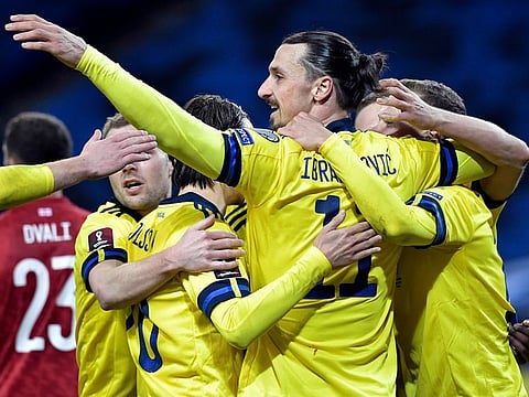 Sweden's Zlatan Ibrahimovic, centre, celebrates after setting up Viktor Claesson’s 35th-minute winner against Georgia.