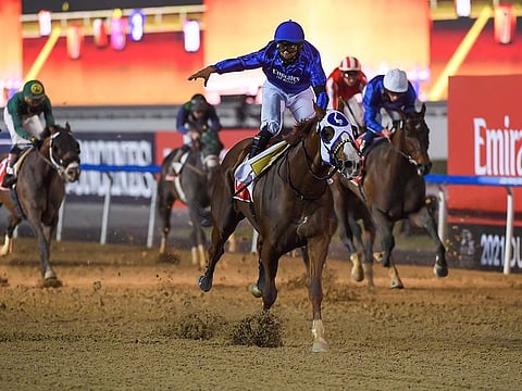 Mystic Guide, ridden by Luis Saez and trained by Michael Stidham, wins the $12 Million Dubai World Cup at Meydan racecourse.