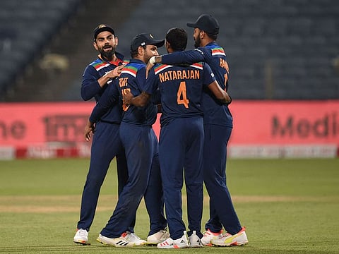 India celebrate their ODI series win over England