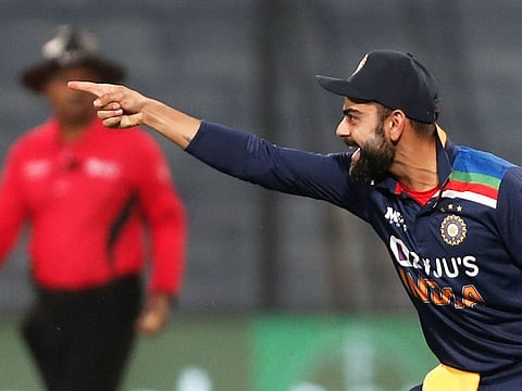 Indian captain Virat Kohli in action during the first One-Day International  against England at the Maharashtra Cricket Association Stadium in Pune, India, on March 23, 2021.