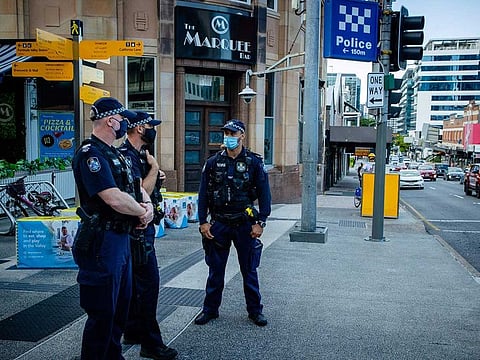 Police officers patrol the Valley Mall in Brisbane on March 29, 2021 as more than two million people in the city entered a three-day lockdown after a cluster of coronavirus cases was detected in Australia's third-biggest city.