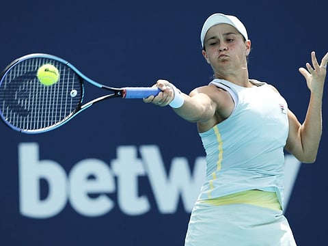 World No.1 Ashleigh Barty of Australia returns a shot en route to her win over Aryna Sabalenka of Belarus during their Miami Open match at Hard Rock Stadium on Tuesday.