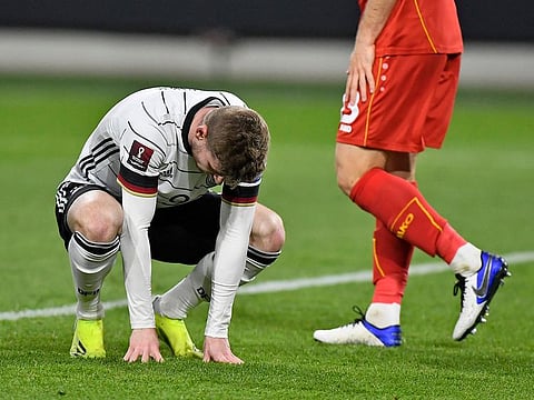 Germany’s Timo Werner reacts after he missed a big chance to score against North Macedonia in Duisburg, Germany, Wednesday, March 31, 2021.
