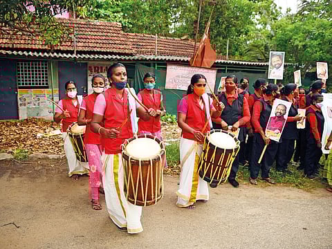 Kerala: Women wearing masks as a precaution against the coronavirus play traditional drums during an election campaign in Alappuzha, Kerala state, India, Thursday, April 1, 2021. (AP Photo/ R S Iyer)