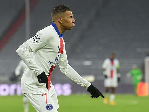 Paris St-Germain forward Kylian Mbappe celebrates scoring against Bayern Munich