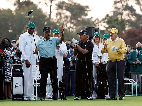 Lee Elder with Jack Nicklaus and Gary Player on the first tee at the Masters in Augusta