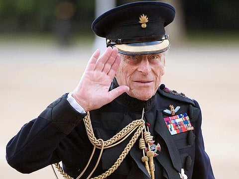 Britain's Prince Philip arrives on the eve of his 90th birthday to take the salute of the Household Division Beating Retreat on Horse Guards Parade in London June 9, 2011.
