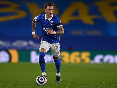 Brighton’s Ben White in action during the Premier League match against Everton at the Falmer Stadium in Brighton, England, Monday, April 12, 2021.