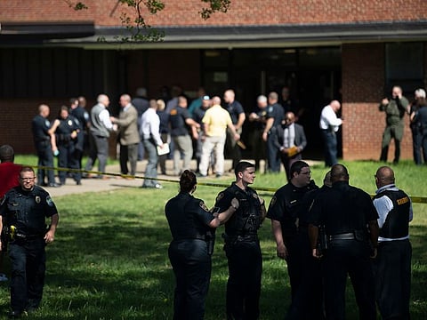 Law enforcement officers respond to a shooting at Austin-East Magnet High School in Knoxville, Tenn., Monday, April 12, 2021.