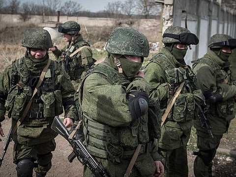 Unidentified soldiers in Crimea, March 6, 2014. Russia has amassed more troops on the Ukrainian border than at any time since 2014.