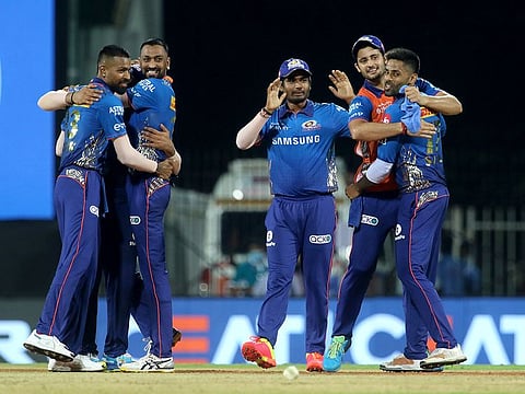 Mumbai Indians players celebrate after winning the match 5 of the IPL against Kolkata Knight Riders at the M. A. Chidambaram Stadium, Chennai.