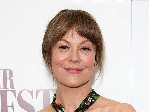 Actress Helen McCrory poses for photographers at a special screening of "Their Finest" at the BFI in central London on April 12, 2017