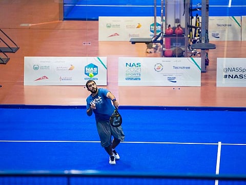 Khalid Al Kamali in action at the NAS Padel Championship during the Nad Al Sheba Sports Tournament