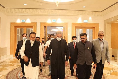 Pakistan Foreign Minister Shah Mahmood Qureshi (second from left), with Ahmed Shaikhani (right) and Imran Chaudhry (left) arrives at the Pakistan Business Council event in Dubai on Saturday.