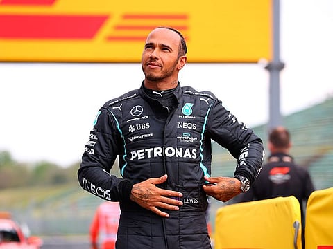 Lewis Hamilton celebrates taking pole position for the Emilia Romagna Grand Prix at Imola